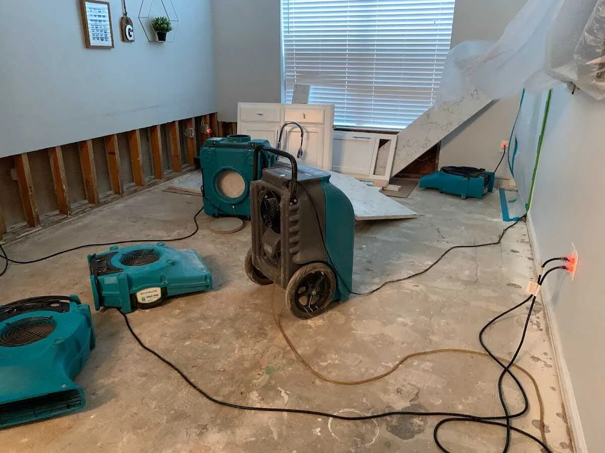 Dehumidifier in flood-cut room for Water Damage Restoration in Upper Freehold